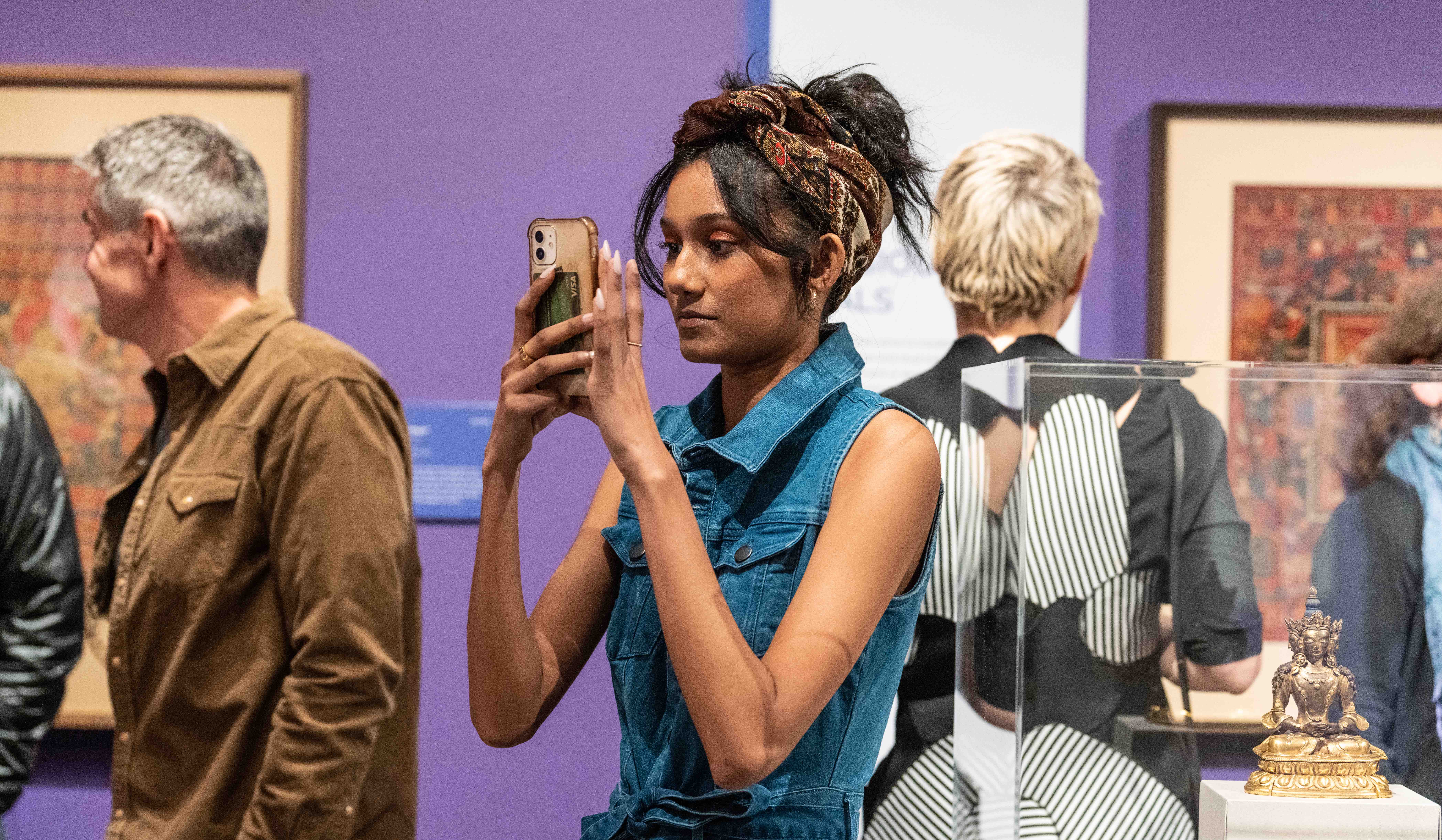 A Lehigh student takes photos during a recent exhibition at LUAG