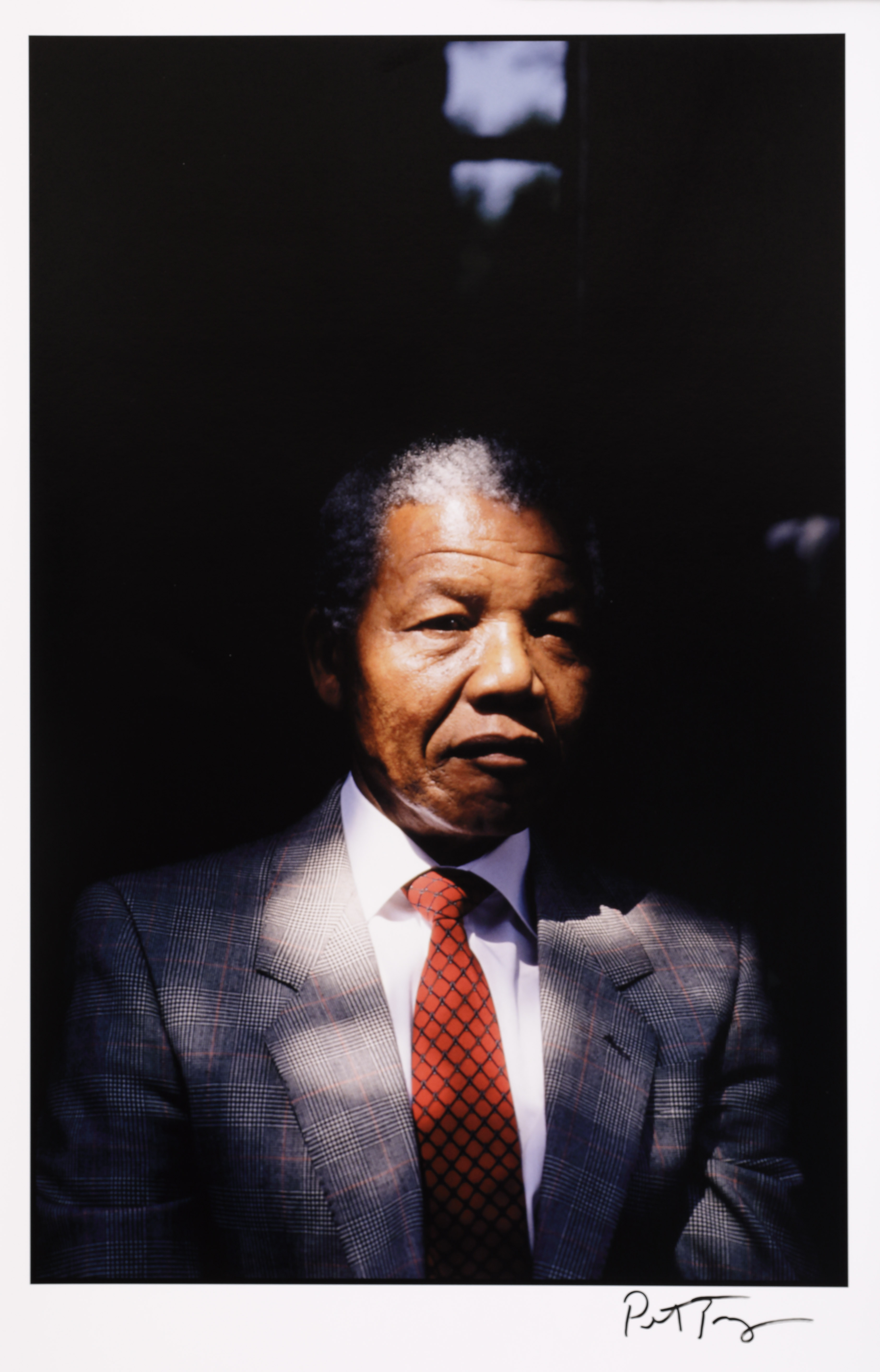 Peter Turnley. Nelson Mandela in his backyard...., 1990. Archival pigment print