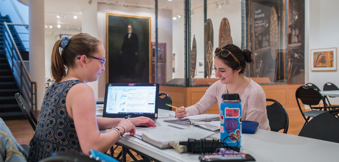 Two students studying in the LUAG Lower Galleries
